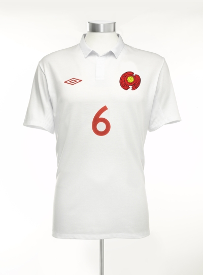 Adami crest on shirt